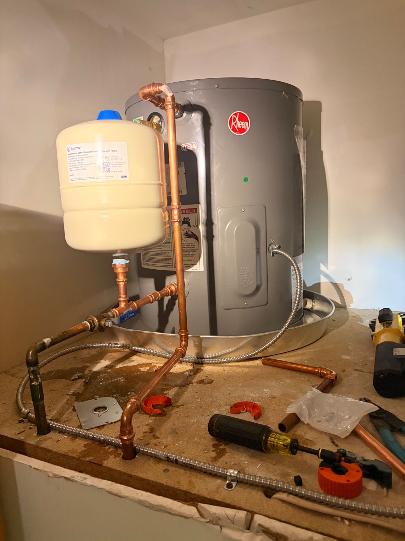 Water heater and thermal expansion tank connected with copper piping